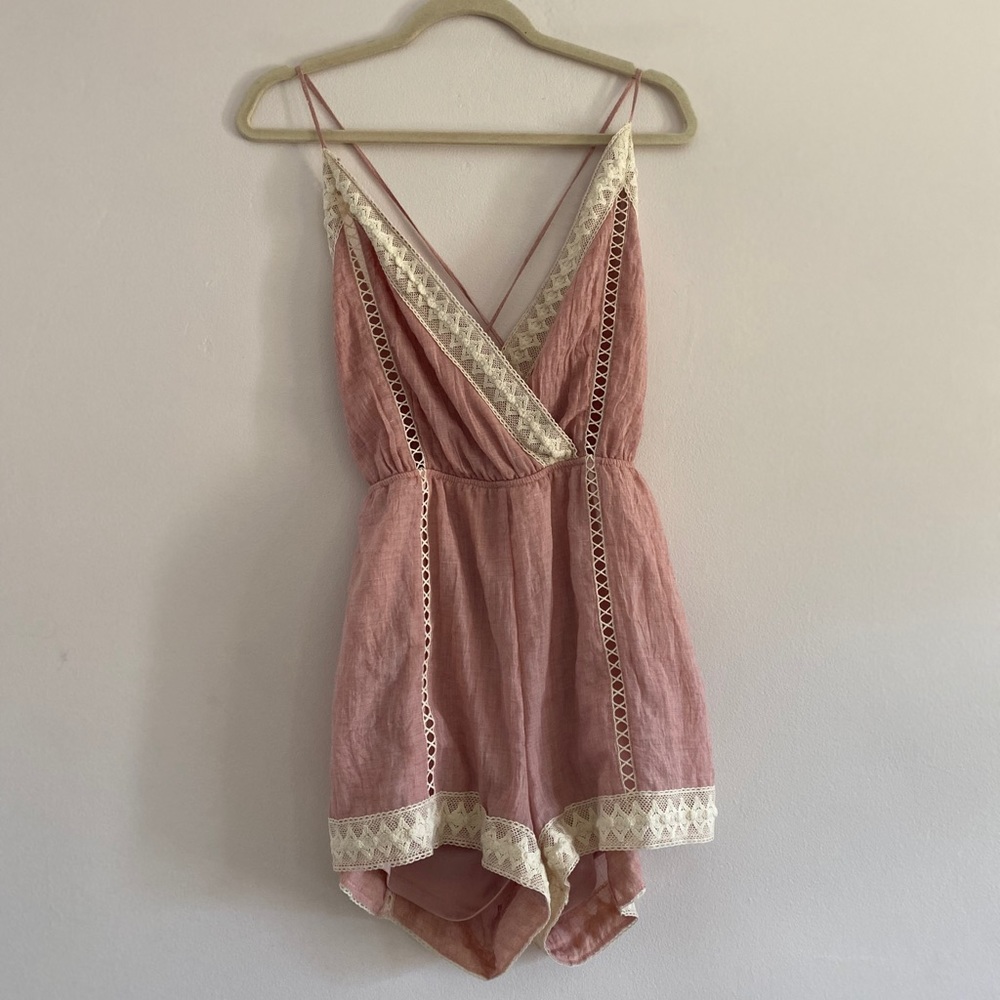 Cute and short pink jumpsuit.